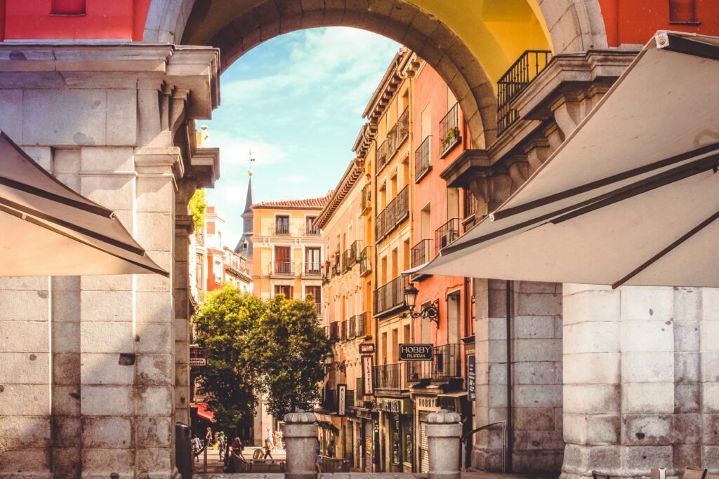 Photo of a gate opening up to Spain showcasing How Americans Can Move to Spain